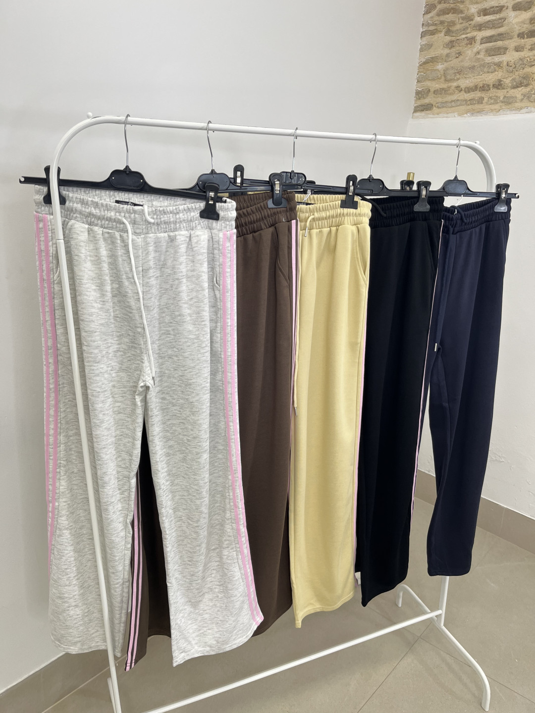 Pantalon felpa raya rosa