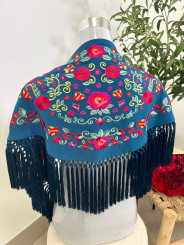 manton niña petroleo flores