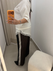 PANTALON RAYA LATERAL ANIMAL PRINT negro