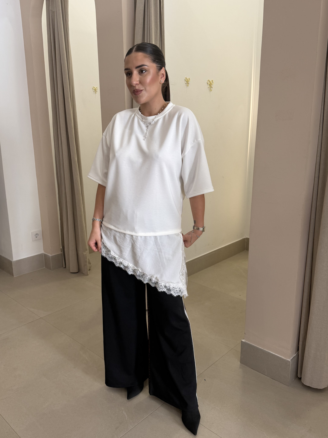 PANTALON RAYA LATERAL ANIMAL PRINT negro