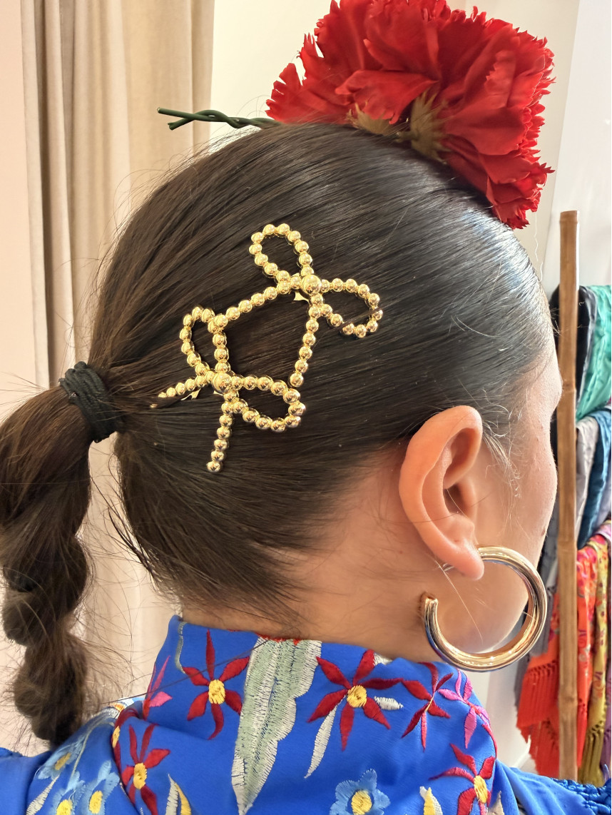 peina lazos bolitas dorados