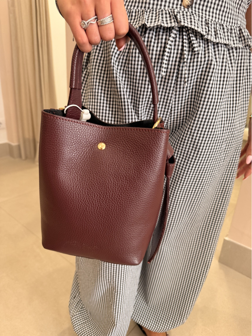 bolso de mano tinto